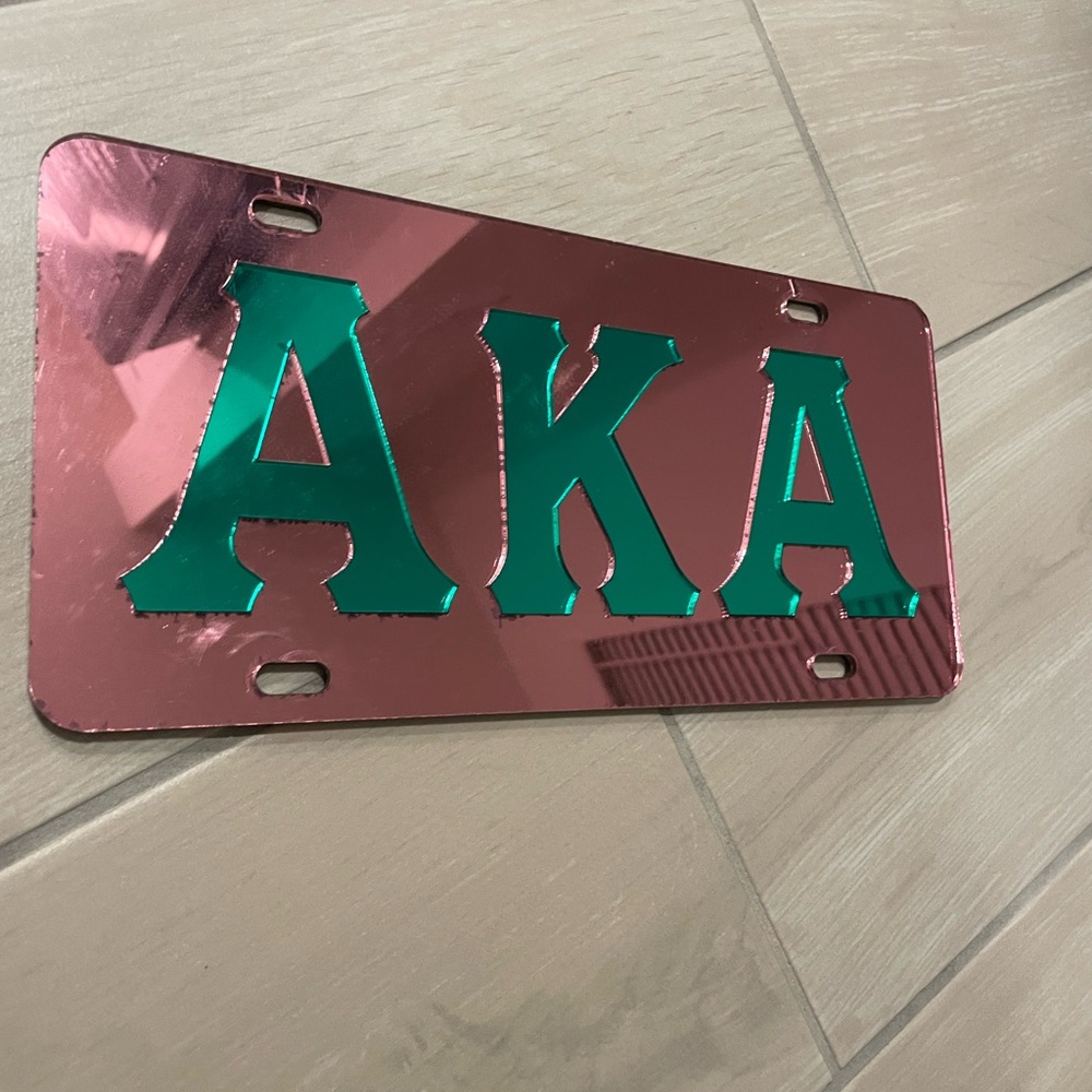 AKA Pink and Green License Plate